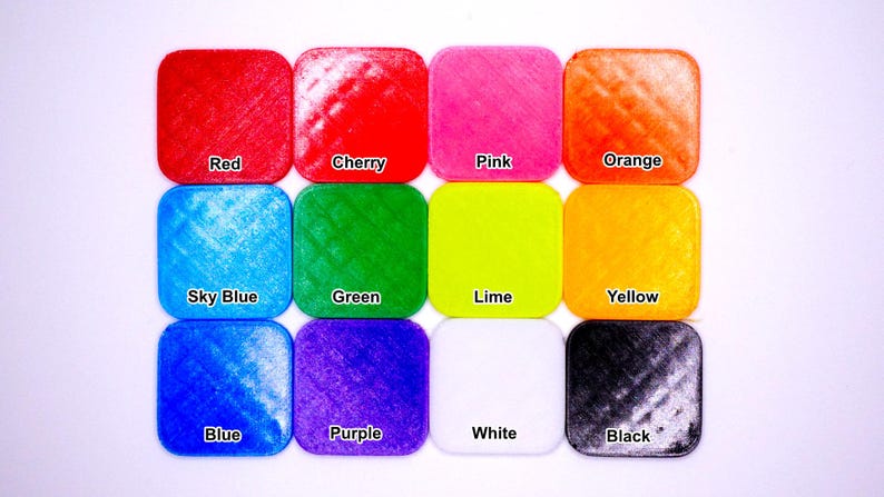 All color options available for the Beyblade X Slip Grips from Momo's Models. The 12 color options include, Red, Cherry, Pink, Yellow, Orange, Lime, Green, Sky Blue, Blue, Purple, Black, and White
