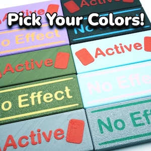 Marcadores de efectos activos (juego de 2): marcadores de doble cara con efecto activo y sin efecto, ideales para cualquier juego de cartas coleccionables o de mesa donde los efectos son importantes.