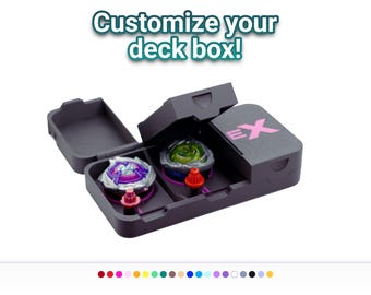 Caja de almacenamiento compacta tipo concha para Beyblade X: una solución pequeña y práctica para llevar tus Beyblades al próximo torneo.