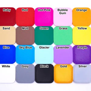 A collection of twenty square color swatches, each labeled with a different color name the can be used when selecting the Beyblade X Pocket Deck Box. Colors include Ruby, Red, Hot Pink, Bubble Gum, Orange, Sand, Mud, Green, Grass, Yellow, Blue, Sky Blue, Glacier, Lavender, Purple, White, Grey, Black, Gold, and Silver.