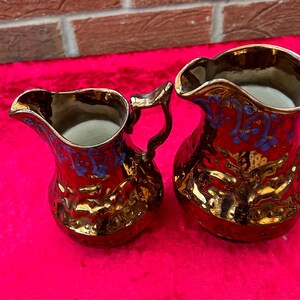 Pair of antique Lustreware jug vases. Victorian, circa 1890