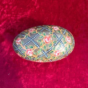 Antique metal Easter egg tin.