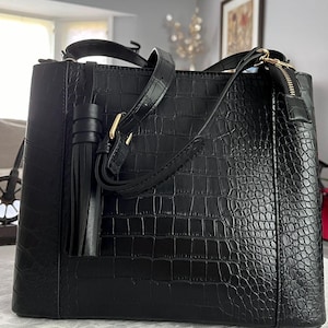 Schwarze Krokodillederhandtasche