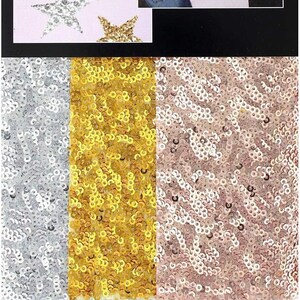 May include: Three sheets of iron-on sequin fabric in silver, gold, and rose gold. Each sheet measures 8 inches by 9 inches. The package includes instructions for personalizing projects.
