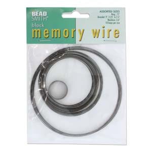 May include: A package of Bead Smith memory wire in assorted sizes. The package is labeled "Bead Smith Black Memory Wire" and shows assorted sizes of wire.