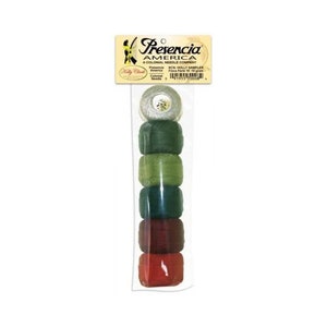 May include: A package of six spools of embroidery floss in a variety of green and red shades. The package is labeled "Presencia America A Colonial Needle Company" and "KCN Holly Sampler Fiaca Parte 16 - 100 gram".