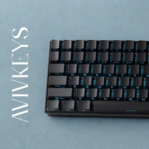 Side printed shine through RGB keycaps close up, black OEM profile PBT keycaps