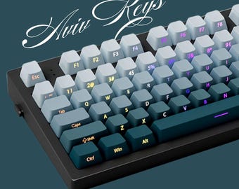 May include: A black mechanical keyboard with a gradient color scheme on the keys. The keys are labeled with the standard QWERTY layout and include function keys, number keys, and arrow keys. The keyboard has a black frame and a USB cable.