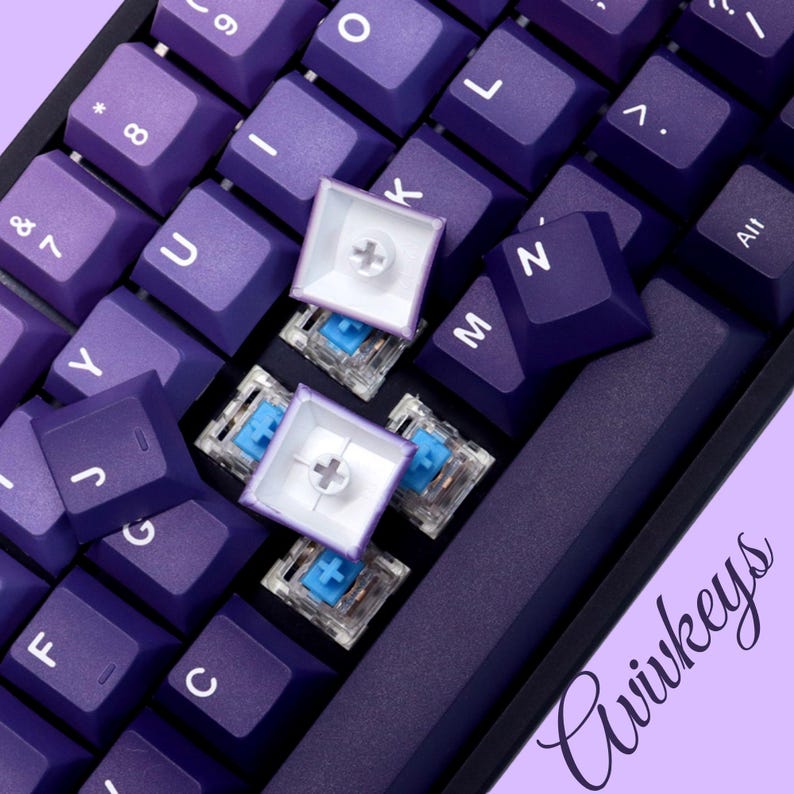 Gradient purple keycaps displayed on desk – 108-key layout for mechanical keyboard