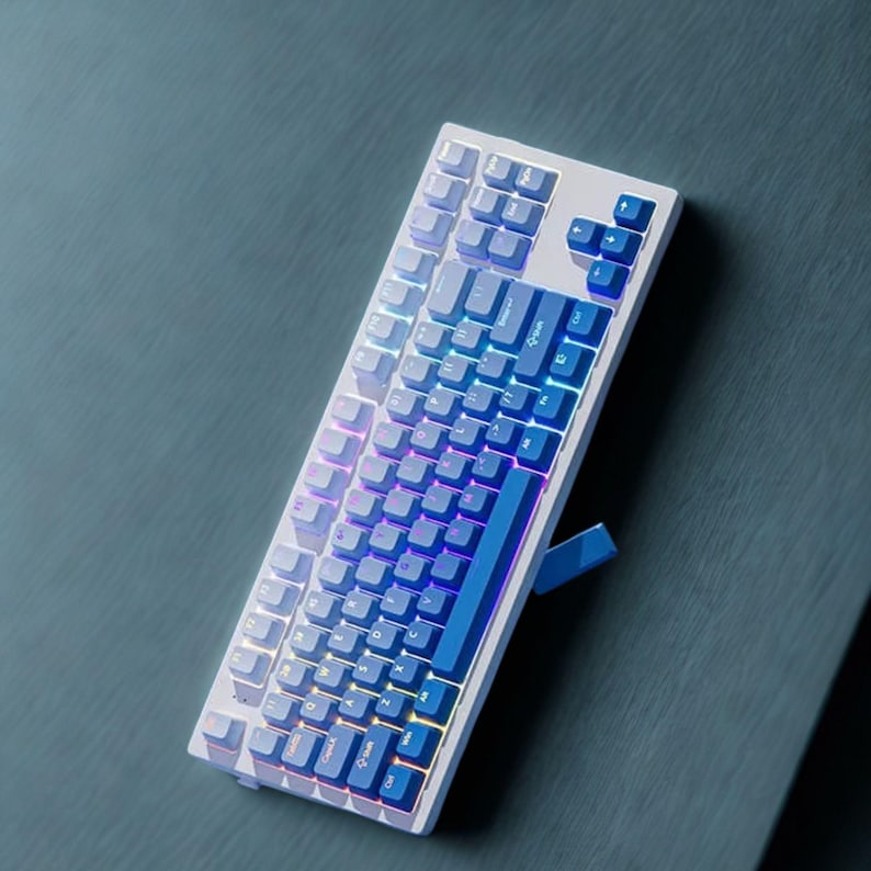 Close-up of shine-through legends on gradient blue double-shot PBT keycaps.