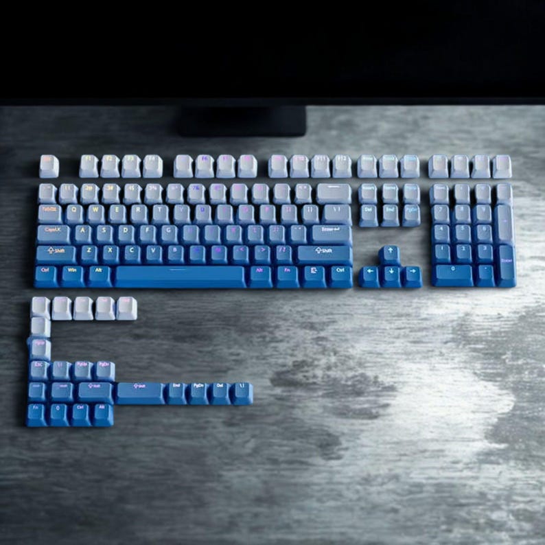 Full keycap layout showing 130+ gradient blue PBT keycaps.