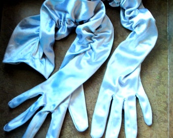 Luxurious vintage 80s, silver metallic, nylon blend,  cinched of the sides, over elbow, opera , stretched gloves. One size fits all.