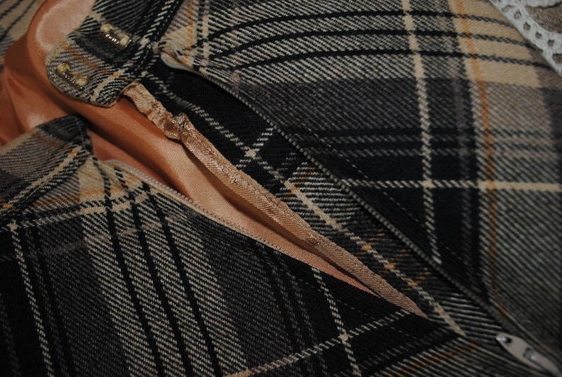 Size 6. black plaid beige,gray A line skirt Made by Evan-Picone wool Classy vintage 70s brown