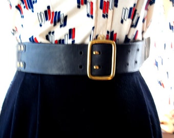 Military style vintage 90s, charcoal black  genuine leather  wide belt with a gold tone metal buckle and studs. By Gap. Size M. Mint Co.