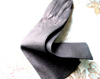 Classy vintage 60s, charcoal black,  textured kid, table cut, opera gloves. Marshal Field. Size 6 1/2. MInt condition.