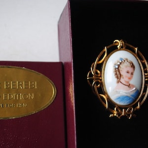 Victorian style vintage 1990, hand painted, Limodes porcelain , cameo brooch with a beautiful portrait  of lady in blue. By E. Berebi.