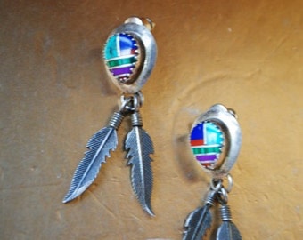 South western vintage 70s,  sterling silver, hand made ,  stud earrings with a multi color, gemstones inlay and drop feather.