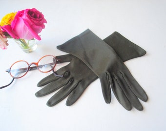 Minimalist vintage 1970, deep olive green  , thick nylon, table cut gloves. By Ornamentation, Rn 2719. Size 7.