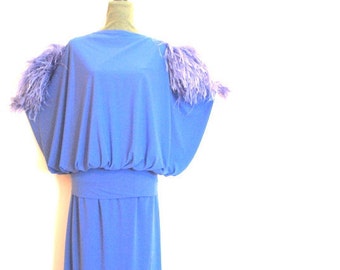 Disco vintag80s, deep lavender polyester costume with a batwing top accented by genuine feather-boa. Made by Michael Maiello . Size 10.