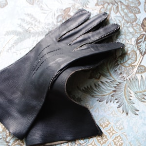 Retro vintage 60s charcoal black genuine calf leather table cut  hand stithed gloves . Made in England. Size 6 1/2