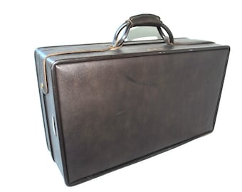 Mod vintage  1960, dark chocolate  brown genuine leather , collectible  belted suitcase by " Hartmann Luggage".
