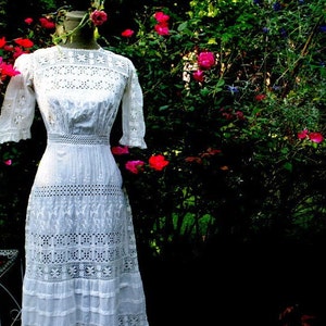 1900 vintage , white thin cotton , wearable art, wedding , edwardian maxi dress  with multiple  style lace, embroidery, pleats. Size Small.