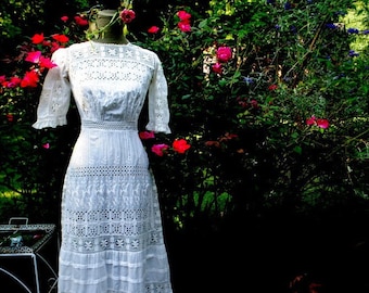 1900 vintage , white thin cotton , wearable art, wedding , edwardian maxi dress  with multiple  style lace, embroidery, pleats. Size Small.