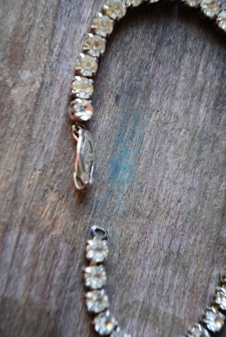 teniss bracelet with a clear rhinestones Classy vintage 60s sterling silver Size7.