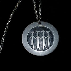1960 vintage  silver tone metal   mod necklace  with large round pewter pendant&quot; Family&quot;  by  Rolland Landerholm for  Tenn, Sweden.