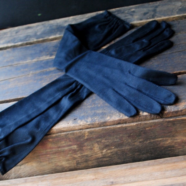 Mod vintage 1960s, black, fine, thick cotton, opera gloves with  stretched elastic. Made by Alexandre in France. Size 6 1/2. Mint condition.