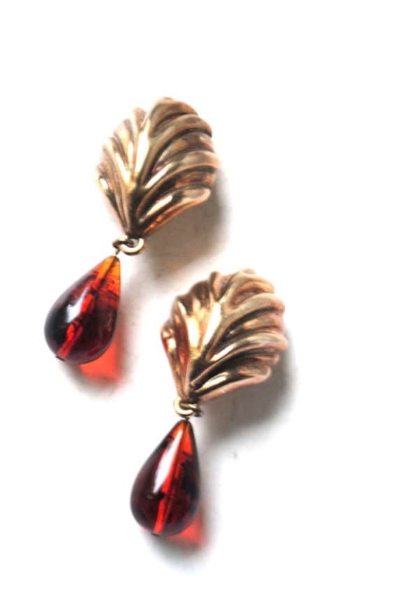 tear drop shape clip on earrings Runway vintage 80s Made by Essex. sculptured gold tone metal satin russian massive