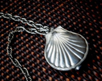 1970 vintage  art deco style   silver plated necklace  with  scalloped seashell   shape   locket  pendant. By Helena Rubinstein.