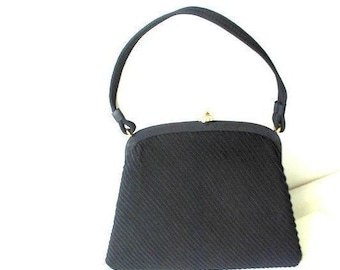 Art deco vintage 1940s , black  accordion pleated fabric, formal, evening  handbag  . Made by JR ( Julious Resnik)  in USA.