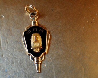 1960  vintage  1/10  12 K    unique , high  school achievement  charm - pendant with  navy blue enamel, East Grand Rapids Mi, by Terryberry.