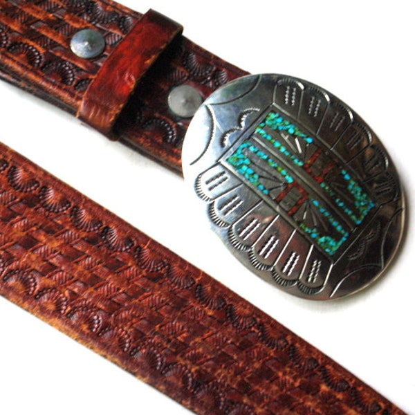 Navajo  vintage  1970,  silver  oval buckle  by J. Nezzie with turquoise and coral , geometric  inlay and genuine leather  tooled belt.