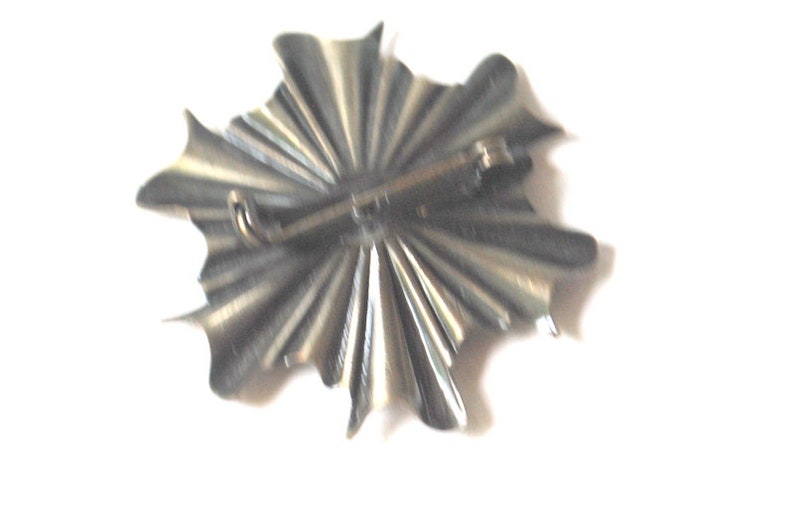 bronze Vintage 70s coat off arm pin. shield brooch griffin