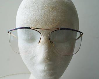 Mod vintage 70s, aviator , women's, optical, asymmetric lenses  eye glasses with a blush blue shades.