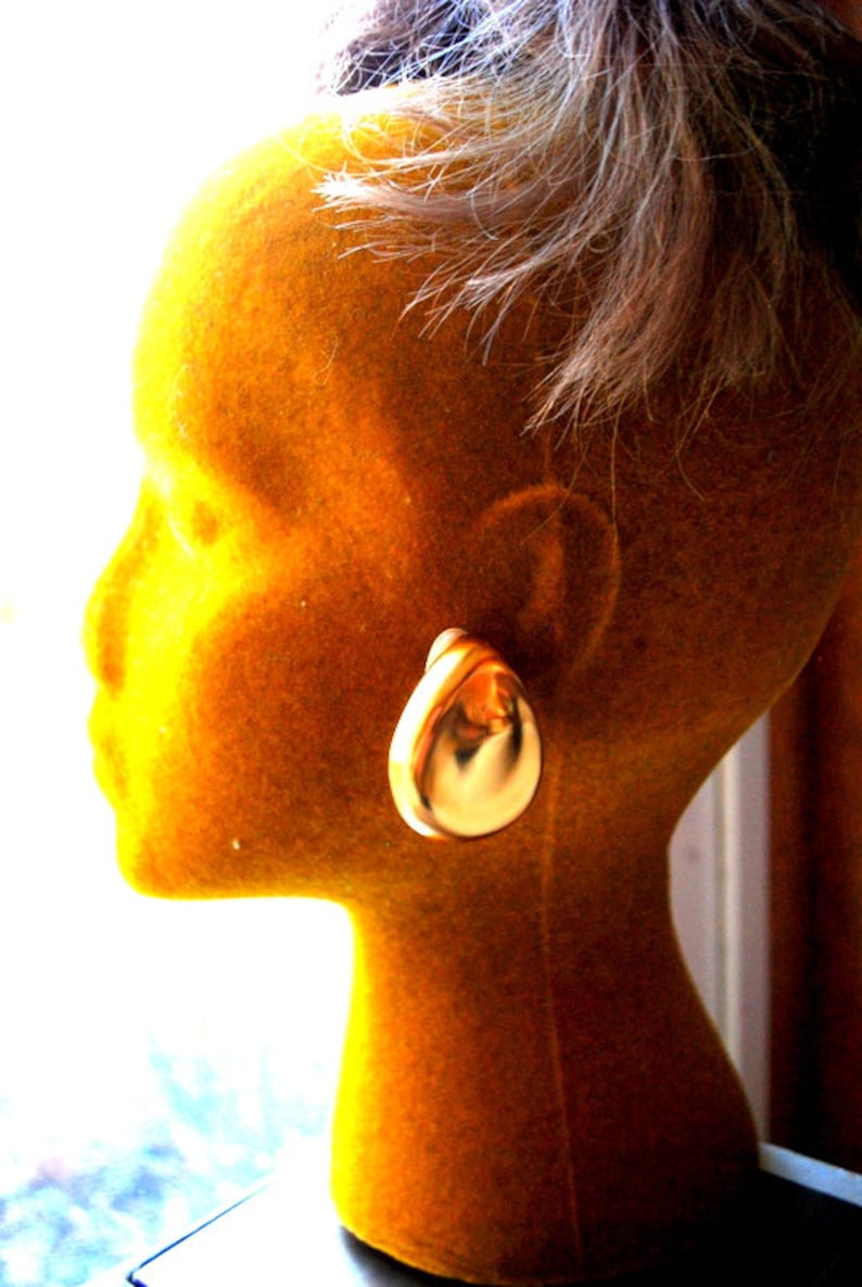 tear drop shape clip on earrings Runway vintage 80s Made by Essex. sculptured gold tone metal satin russian massive