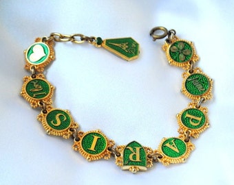 1970 vintage , unique  souvenir , tourist , reversible  gold tone metal bracelet , 9 emerald green  plaques" I Love Paris",  Size 8.