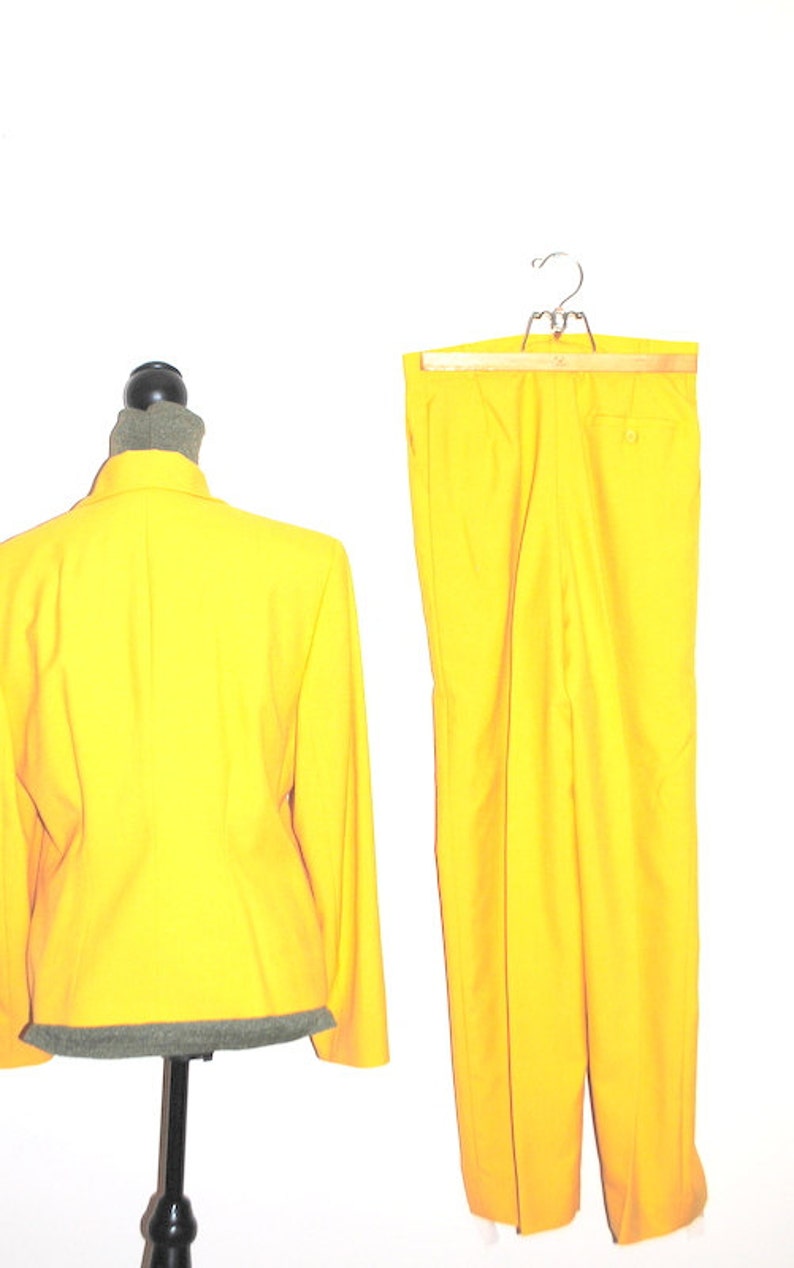 Beverly Hills Giovanni London Paris Luxurious vintage 80s canary yellow rayon blend suit.Made by Valentino Rome Size Medium.