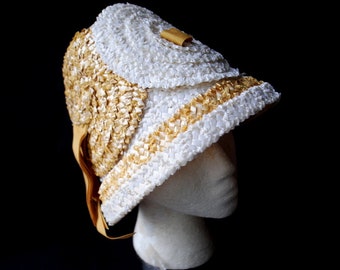 1960  vintage ,  superb   unique , mod style, , conus - bucket  shape cloche  braided  raffia hat. Hat's by Barbara Denise, size 21.