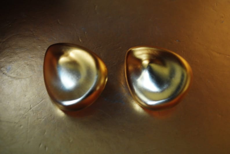 tear drop shape clip on earrings Runway vintage 80s Made by Essex. sculptured gold tone metal satin russian massive