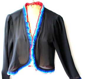 Classy vintage 80s, black  polyester bolero- capelet with a multicolor ruffles. Made by Phillipe Ferrali. Paris- London-New York.  Small.