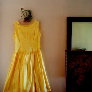 Summer fashion vintage 60s yellow , cotton, hand made, sleeveless dress with a boat neck line and pin tack. Size4.