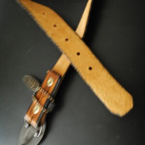 Boho vintage 70s caramel brown, genuine tooled leather, womens belt with oval shape, brass ,Lee buckle. image 5