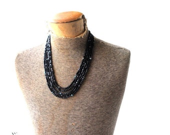 Glamour vintage 60s jet black, five strand necklace with asymmetric sturdy  plastic beads and black rhinestones. Made in Western Germany.