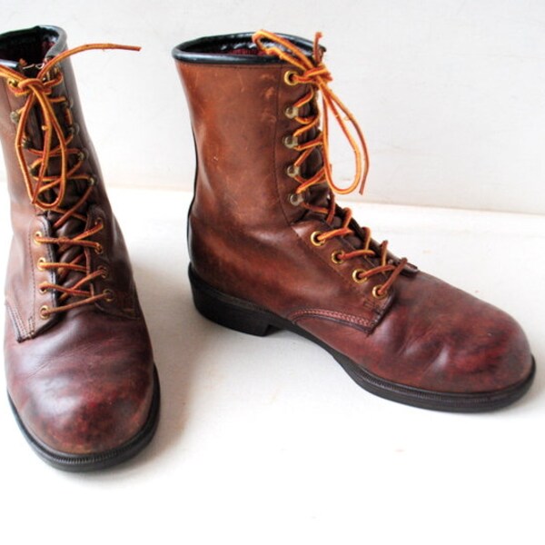 1990  vintage , dark brown  genuine leather , combat  style, ankle, working   boots with sturdy  toe. Made by Wolverine in USA.  Size 9 1/2