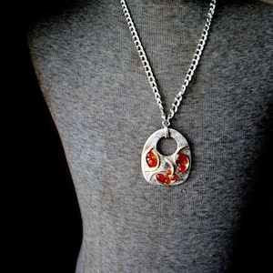 Mod vintage 60s silvertone metal necklace with a  white  ceramic , geometric style pendant. Made in West Germany.