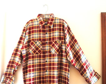 Classy vintage 70s, multi color plaid , cotton, men's shirt with a two front pockets. Made by Dee Cee. Size L. Mint condition.
