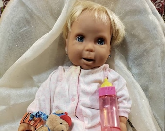 miracle moves baby doll